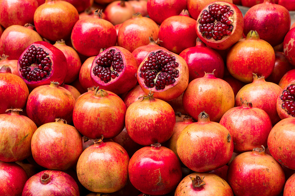 pile of pomegranates
