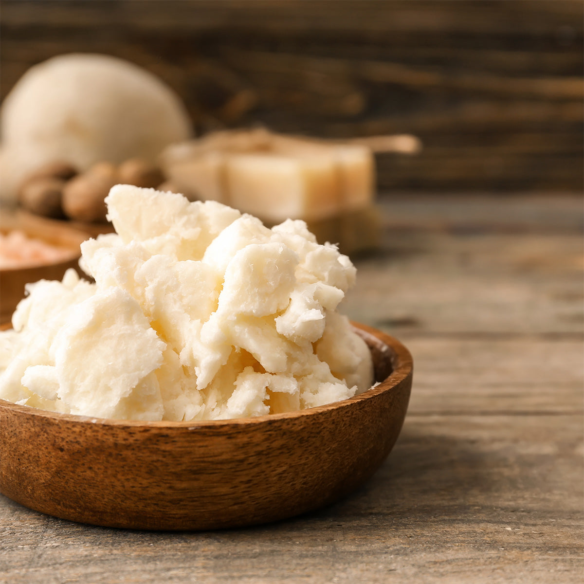 shea butter in a wood bowl