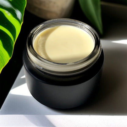 banana barrier cream in black jar
