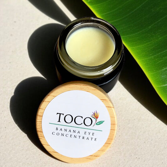 Banana eye concentrate in black jar with lid