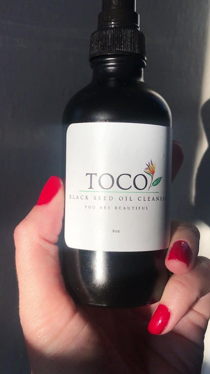 Black seed oil cleanser in black bottle